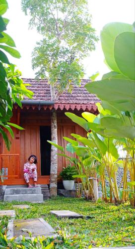 Сад в Angler Homestay & Joglo