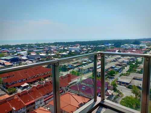 a view of a city from the balcony of a building at Sekinchan HighLevel SeaView Homestay 高楼 看海 阳台民宿 in Sekincan