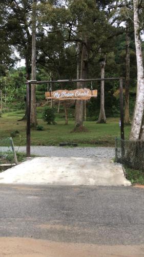 a sign that reads our secret garden in a park at MyDusun Chalet, Taiping, Perak, Malaysia in Taiping