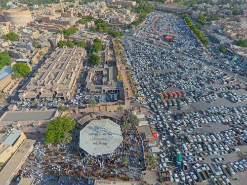an aerial view of a large parking lot at Highness Villa Nizwa in Nizwa