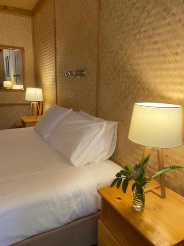 Ένα ή περισσότερα κρεβάτια σε δωμάτιο στο Tallow Beach Motel