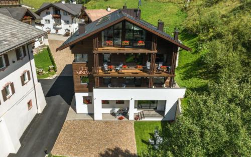 an overhead view of a house with a balcony at Chalet Miriam in Selva di Val Gardena