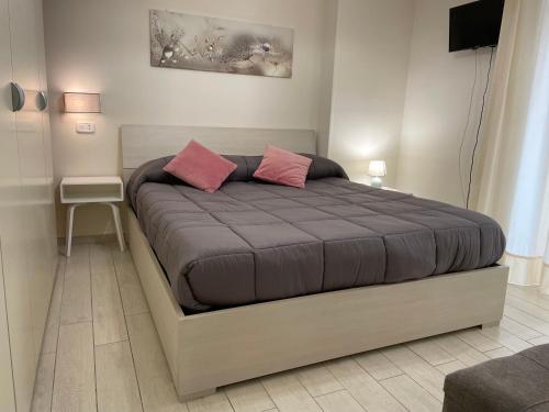 Ένα ή περισσότερα κρεβάτια σε δωμάτιο στο Casa Vacanze Rachele