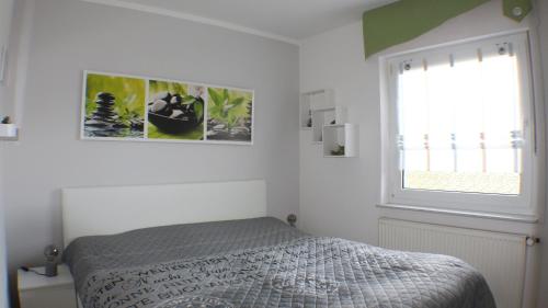 Postel nebo postele na pokoji v ubytování Sanibel