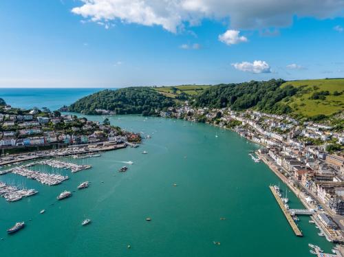 an aerial view of a harbor with boats in the water at Waterfront House in Dartmouth