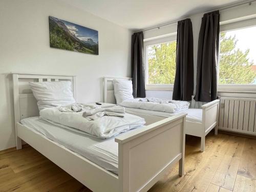 Säng eller sängar i ett rum på SAD150 - Moderne Monteurwohnungen in Schwandorf mit Balkon