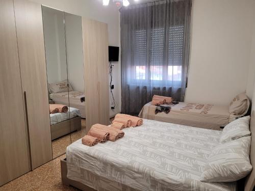 Postel nebo postele na pokoji v ubytování Appartamento Todaro