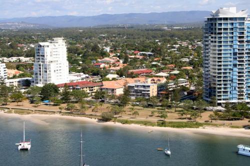 an aerial view of a city with a beach and buildings at Blue Waters Apartments in Gold Coast