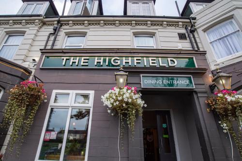 a building with a sign that reads the highestfield at Highfield Hotel By Greene King Inn in Middlesbrough