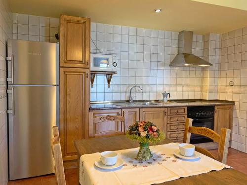 Кухня или мини-кухня в Casas rurales Valle de El Paular
