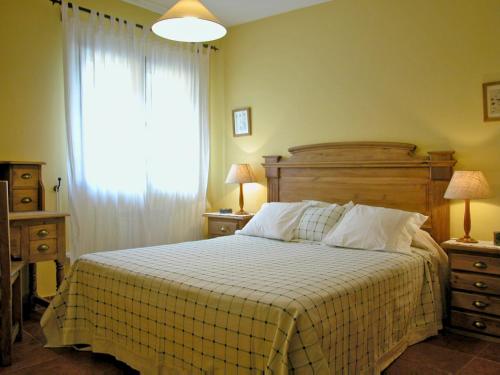 Кровать или кровати в номере Casas rurales Valle de El Paular