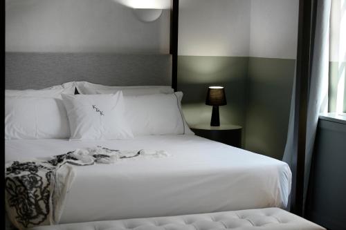 Letto o letti in una camera di ATHINAIDOS QUARTERS by K&K