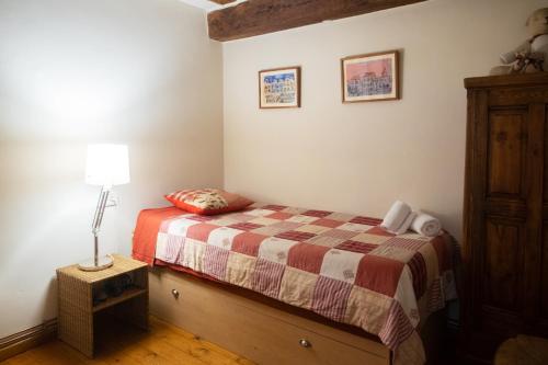 Cama o camas de una habitación en Cal Manso