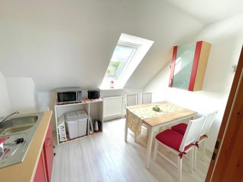 Kuchyň nebo kuchyňský kout v ubytování Ferienwohnung Fröhlich