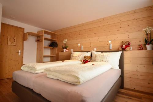 Un pat sau paturi într-o cameră la Hotel Terminus