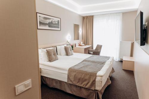 Nota Bene Hotel & Restaurantにあるベッド