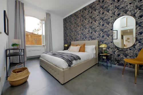 Rúm í herbergi á Tiberina