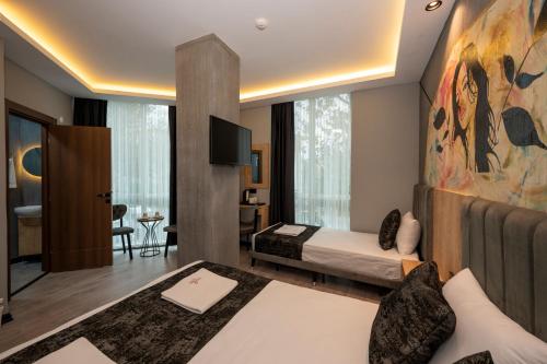 Ένα ή περισσότερα κρεβάτια σε δωμάτιο στο Comfort Point