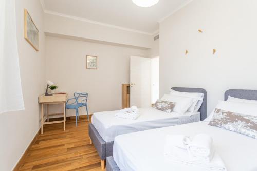 Posteľ alebo postele v izbe v ubytovaní Maison Silvestri