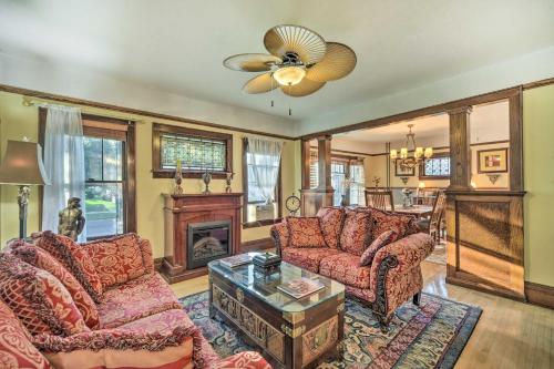a living room with two couches and a fireplace at Elegant Superior Getaway Less Than 2 Mi to Downtown! in Superior