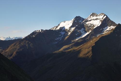a mountain range with snow on top of it at The Capra Saas-Fee in Saas-Fee