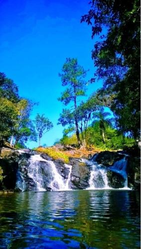 a waterfall in the middle of a body of water at Hostel Trilhas e Rotas - a 150m da Avenida Paulista in Sao Paulo