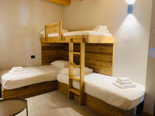 Posteľ alebo postele v izbe v ubytovaní Chalet Monfol Superior