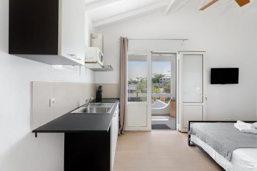 Ένα ή περισσότερα κρεβάτια σε δωμάτιο στο Villa Mallory, 3 bedrooms, private pool and ocean view