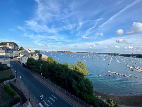 a view of a river with boats in the water at Rosa*Studio *Belle Vue Mer*Dinard* in Dinard