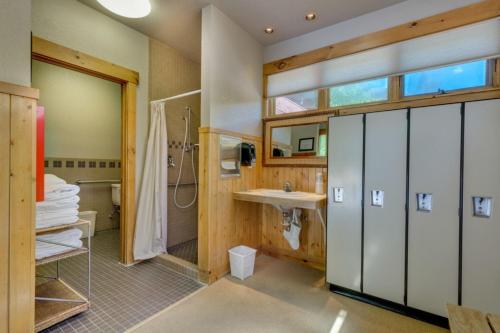 a bathroom with a shower and a sink at Ski Tip by Summit County Mountain Retreats in Keystone