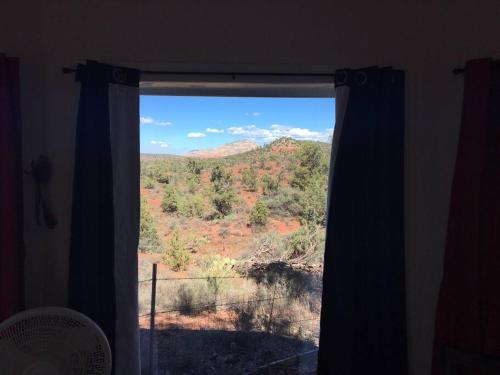 a window with a view of a desert view at Sedona Sacred Rocks - The Fairy Suite in Sedona