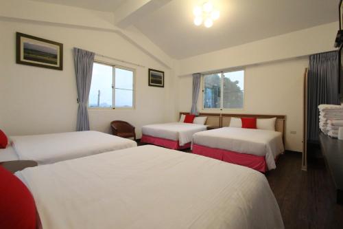 Postel nebo postele na pokoji v ubytování Otousann B&B