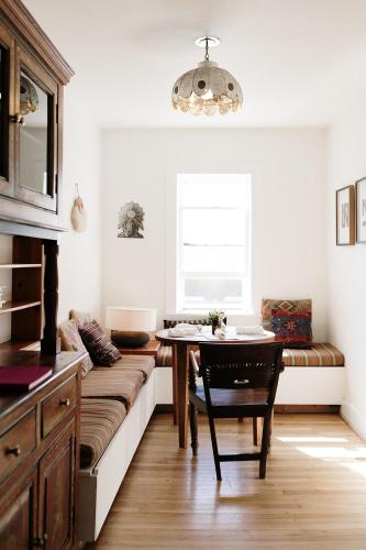 a living room with a couch and a table at The Parador in Santa Fe