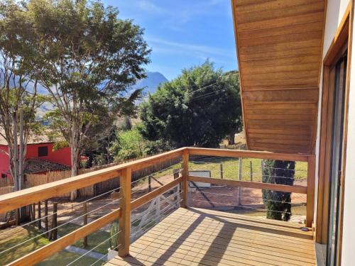 a view from the balcony of a house at Chale Vale Encantado in São Bento do Sapucaí