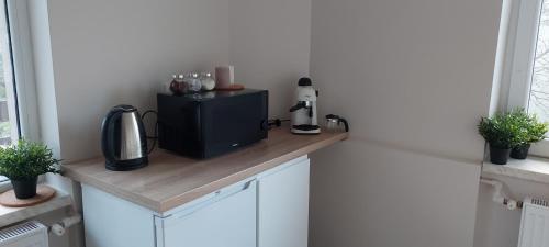 Una cocina o zona de cocina en APARTAMENTY MONTANIA WISŁA