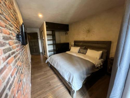 Postel nebo postele na pokoji v ubytování Increíble Loft Completo en Val'Quirico