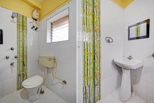 a bathroom with a toilet and a sink at Goroomgo Elite Stay Salt Lake Kolkata Near Metro Station in Kolkata