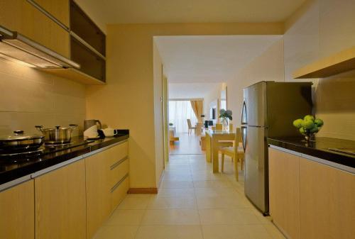 Η κουζίνα ή μικρή κουζίνα στο Blanco Apartment Hotel