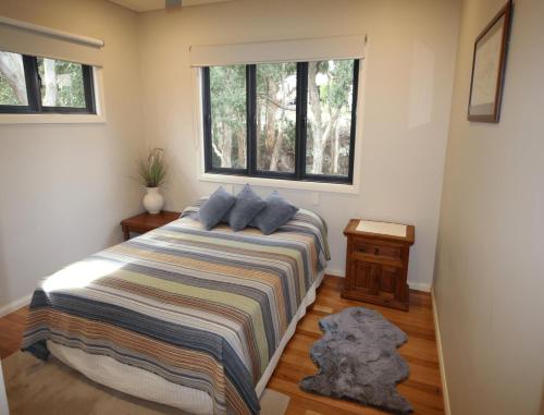 Una cama o camas en una habitación de Berringar - linen not included