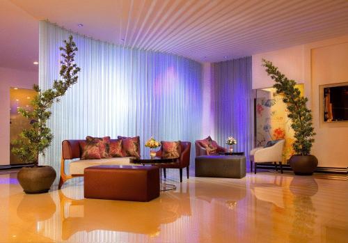 Χώρος καθιστικού στο Blanco Apartment Hotel