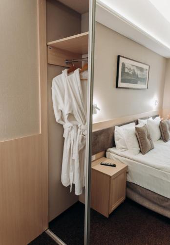 Nota Bene Hotel & Restaurantにあるベッド
