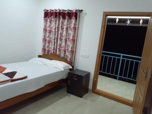 Postel nebo postele na pokoji v ubytování Dream Nest Homestay