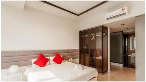 Tempat tidur dalam kamar di EXPRESSIONZ by GSuites
