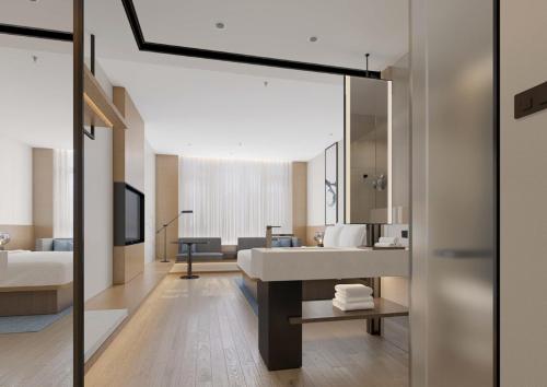 Ένα ή περισσότερα κρεβάτια σε δωμάτιο στο Fairfield by Marriott Liaocheng Dongchangfu