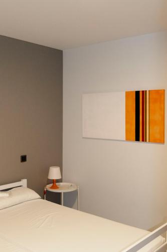 Ein Bett oder Betten in einem Zimmer der Unterkunft Suseia