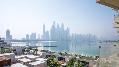 a view of the city from a building at Maison Privee - Luxury Sea View Apt in FIVE Resort on The Palm in Dubai