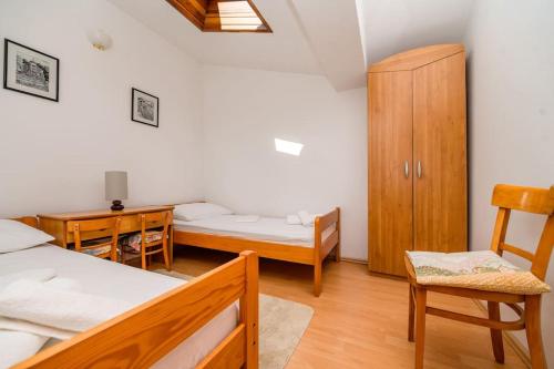 Postel nebo postele na pokoji v ubytování Bozena 1/4