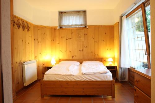 Posteľ alebo postele v izbe v ubytovaní Carlo B Garten Ferienwohnung EG