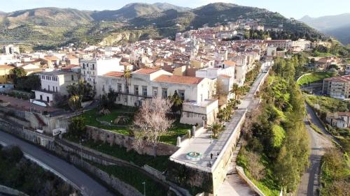 an aerial view of a town on a mountain at THE PALACE B&B and Apartments in Santo Stefano di Camastra