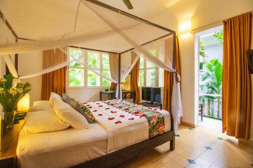 a bedroom with a bed in a room at PAVILION in Phnom Penh